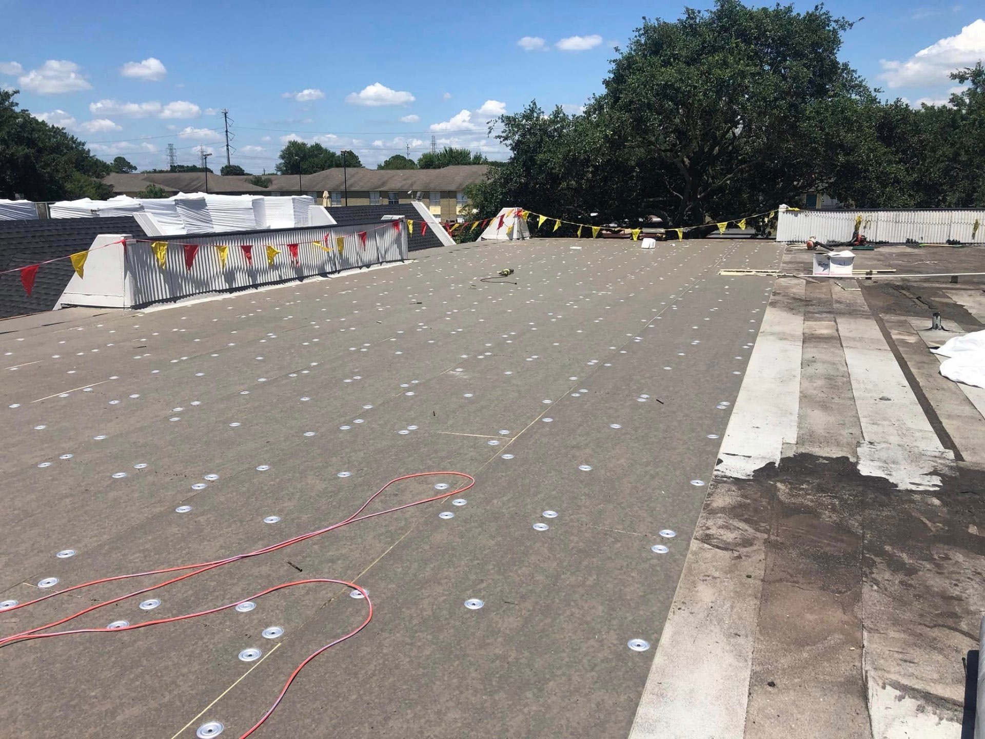 Commercial flat-roof install in progress