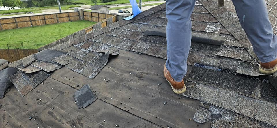 CCS inspector walking a Houston home's roof